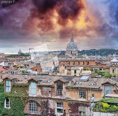 Image of Wonderful view of Rome at sunset with St Peter Cathedral