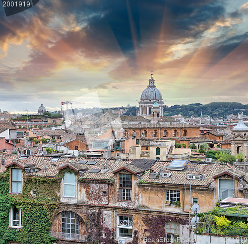 Image of Wonderful view of Rome at sunset with St Peter Cathedral