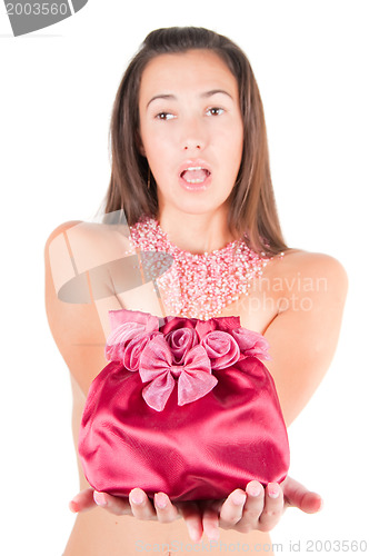 Image of Beautiful brunette with small pink bag