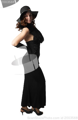 Image of girl in a black dress and a hat