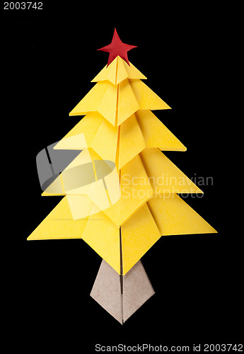 Image of Yellow christmas tree black isolated 