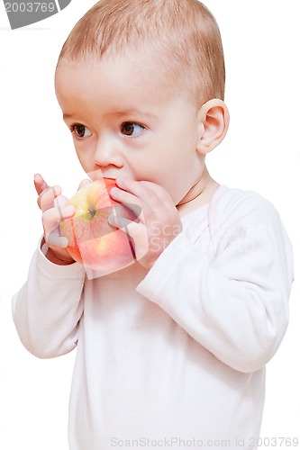 Image of Baby girl eating healthy food isolated