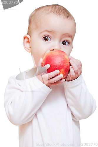 Image of Baby girl eating healthy food isolated