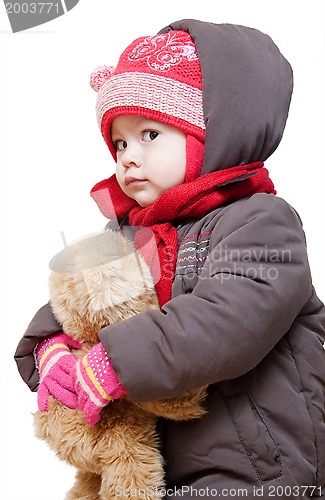 Image of Baby in winter clothes on a white background