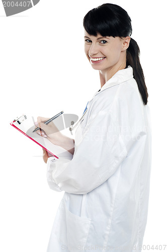 Image of Nurse writing fresh prescription for the patient