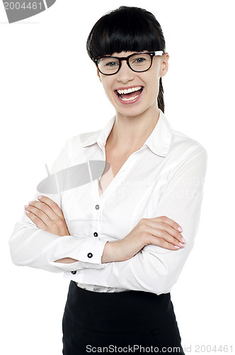 Image of Bespectacled happy woman posing casually