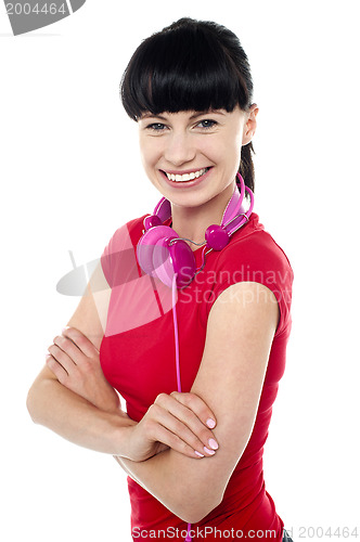 Image of Casual music geek girl posing with confidence