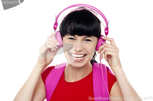 Image of Trendy music lover college student