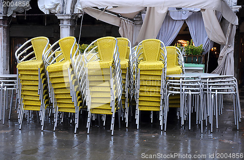 Image of Stack of Chairs and Tables in the Fall