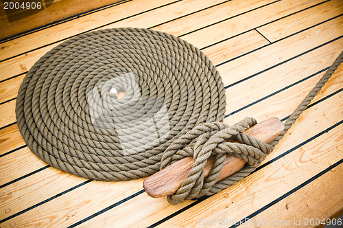 Image of Close-up shot of rope. Taken at a shipyard. 