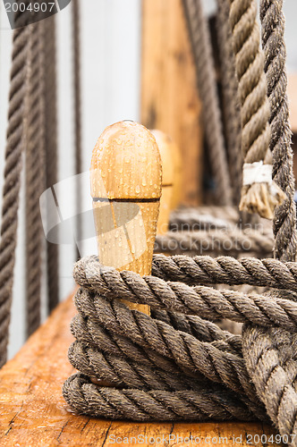 Image of Close-up shot of rope. Taken at a shipyard. 