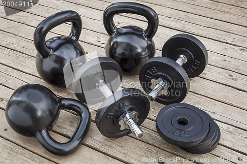 Image of kettlebells and dumbbells