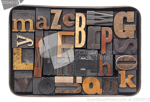 Image of vintage wood alphabet in box