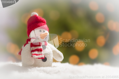 Image of Cute Snowman Over Abstract Background