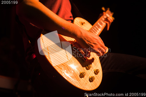 Image of Guitarist on stage