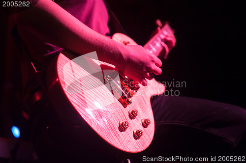 Image of Guitarist on stage