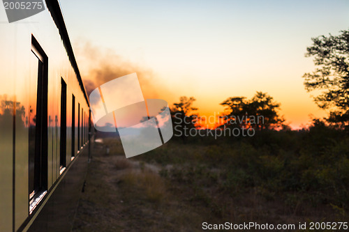 Image of Train into sunset