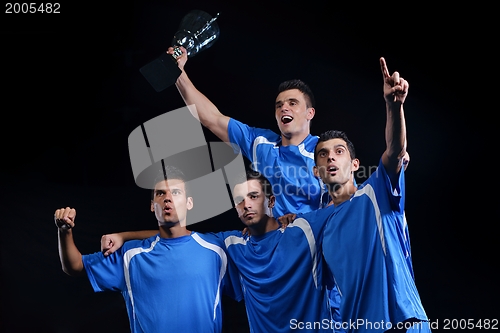 Image of soccer players celebrating victory