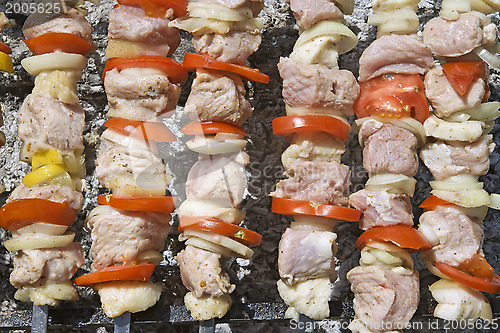 Image of Raw shashlik on a skewer