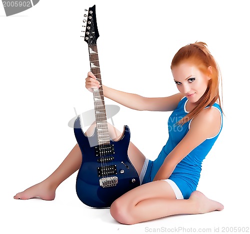 Image of Beautiful woman with guitar