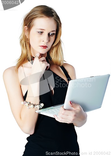 Image of Attractive blonde girl with laptop