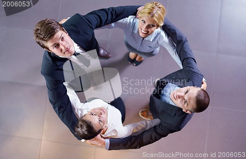 Image of business people group joining hands