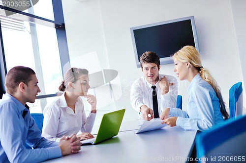 Image of business people in a meeting at office