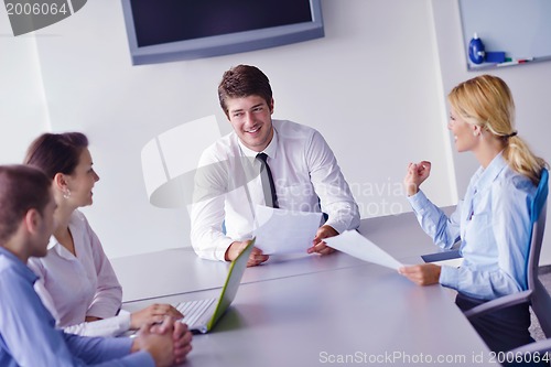 Image of business people in a meeting at office