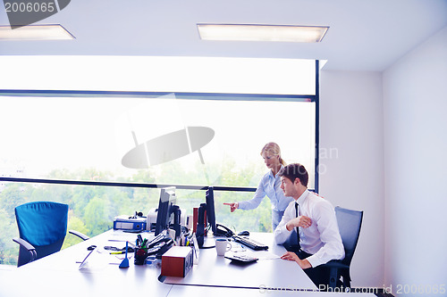 Image of business people in a meeting at office