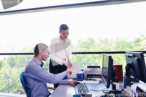 Image of business people in a meeting at office