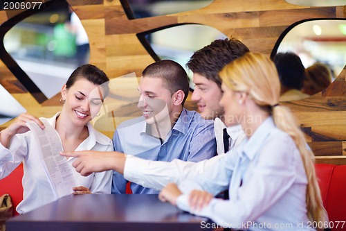 Image of business people in a meeting at office