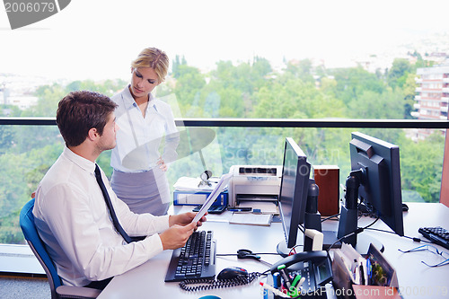 Image of business people in a meeting at office