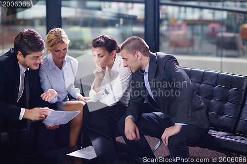 Image of business people making deal