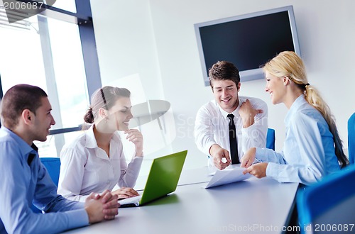 Image of business people in a meeting at office