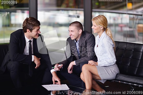 Image of business people making deal