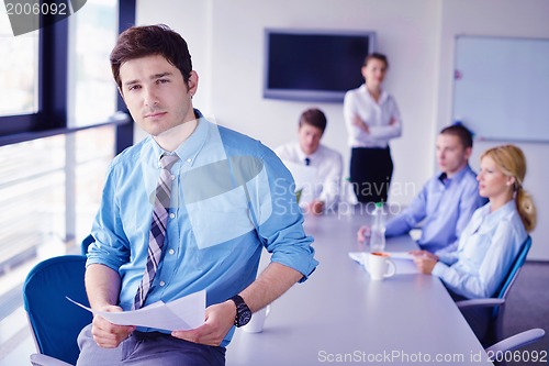 Image of business people in a meeting at office