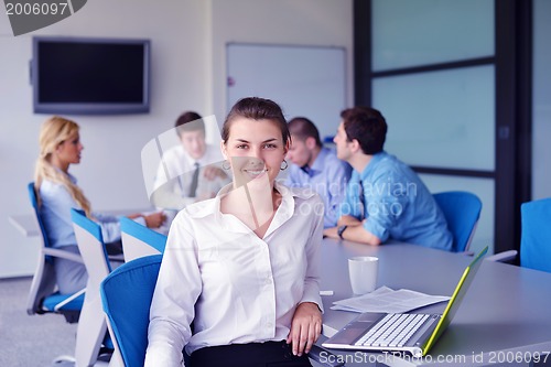 Image of business people in a meeting at office