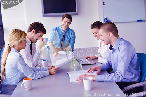 Image of business people in a meeting at office