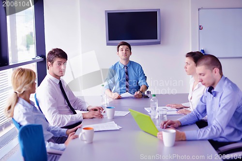 Image of business people in a meeting at office