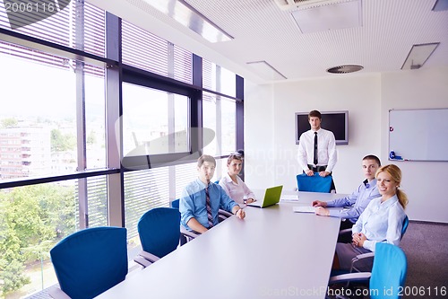 Image of business people in a meeting at office