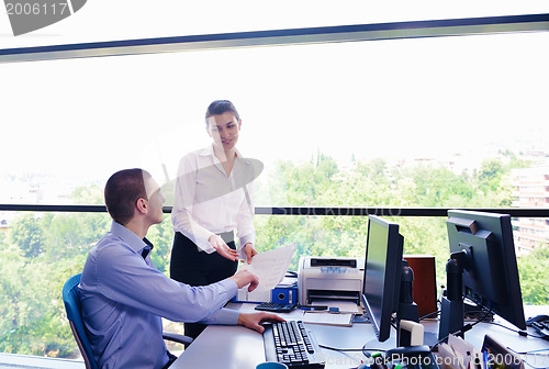 Image of business people in a meeting at office