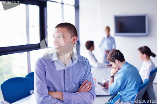 Image of business people in a meeting at office