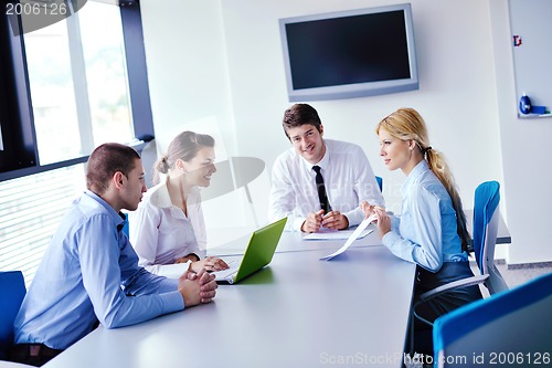 Image of business people in a meeting at office