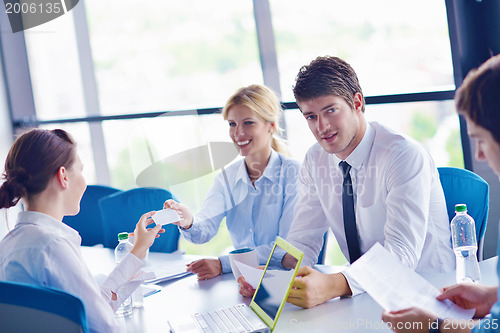 Image of business people in a meeting at office