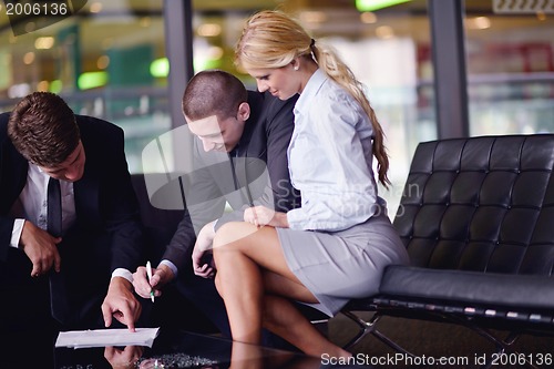 Image of business people making deal