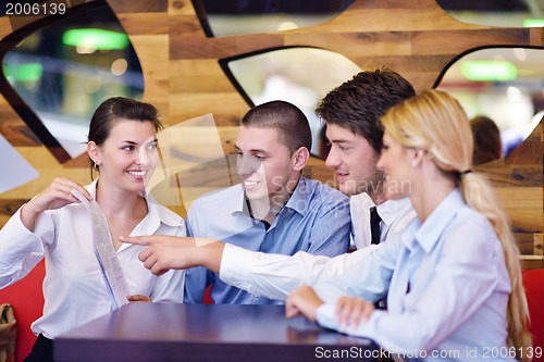 Image of business people in a meeting at office