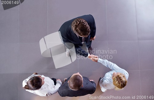 Image of business people making deal