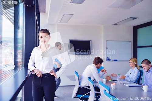 Image of business people in a meeting at office