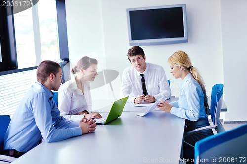 Image of business people in a meeting at office