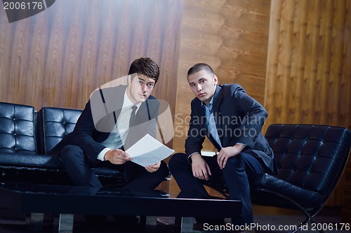 Image of business people making deal